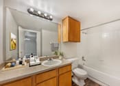 Thumbnail 26 of 27 - Bathroom with a white toilet at Great Hills, Austin Texas