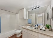 Thumbnail 27 of 27 - Bathroom with a toilet and sink at Great Hills, Austin Texas