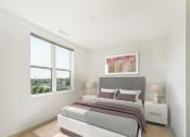 Thumbnail 4 of 34 - a bedroom with a bed and two windows at The Merc, Waltham