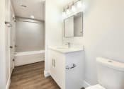 Thumbnail 18 of 36 - a bathroom with a sink and a toilet at Paramount on Lake Eola, Orlando, FL