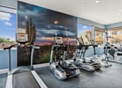 Thumbnail 16 of 27 - Fitness center with cardio equipment at Pima Canyon, Tucson, Arizona