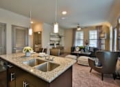 Thumbnail 17 of 37 - Kitchen and Living Room at The Legend, Waco, TX