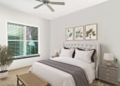 Thumbnail 30 of 31 - a bedroom with white walls and a large window with blinds