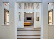 Thumbnail 18 of 27 - a view of the clubhouse from the entryway at Vizcaya, New Mexico, 87505
