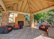 Thumbnail 27 of 34 - Outdoor lounge with fireplace at Vizcaya, Santa Fe, NM