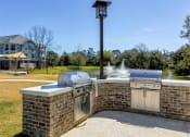Thumbnail 5 of 37 - Outdoor Kitchen at Wharf 7 Apartments, South Carolina, 29492