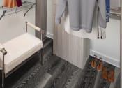 Thumbnail 5 of 12 - a spacious wardrobe with a bench and hangers  at SLX Atlanta, Chamblee