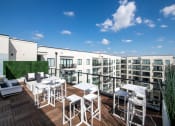 Thumbnail 10 of 12 - Rooftop deck and lounge area| SLX Atlanta  at SLX Atlanta, Chamblee, GA
