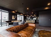 Thumbnail 22 of 28 - Modern Lounge at Maven on Broadway Apartments, Rochester, MN, 55904