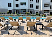 Thumbnail 30 of 30 - Pool with lounge chairs at Stonelake at the Arboretum, Texas, 78759