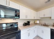 Thumbnail 3 of 25 - Kitchen at The Brittany, Indialantic, Florida