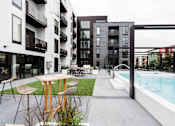 Thumbnail 13 of 28 - Rooftop Pool and patio at Maven on Broadway Apartments, Minnesota, 55904
