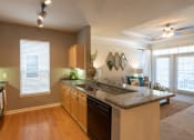 Thumbnail 22 of 41 - Kitchen at The Park at Monterey Oaks, Austin, Texas