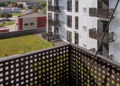 Thumbnail 18 of 40 - a view of an apartment building from a balcony at Maven on Broadway, Minnesota, 55904