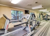 Thumbnail 7 of 31 - Fitness center at Village Oaks Apartments, Texas, 78759