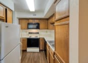 Thumbnail 18 of 31 - Kitchen gallery at Village Oaks Apartments, Austin, TX, 78759