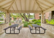 Thumbnail 6 of 31 - Picnic area at Village Oaks Apartments, Texas