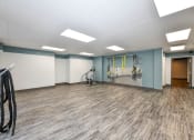 Thumbnail 3 of 25 - a fitness room with  weights at 670 Thornton, Lithia Springs, Georgia