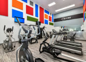 Thumbnail 1 of 25 - a room filled with lots of cardio exercise equipment at 670 Thornton, Lithia Springs