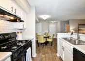 Thumbnail 19 of 25 - a kitchen and dining area at 670 Thornton, Lithia Springs, 30122
