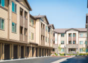 Thumbnail 16 of 36 - an empty street in front of an apartment buildingat Estate at Woodmen Ridge, Colorado, 80923