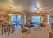 Thumbnail 14 of 29 - Living Room with bright lights at Arterra, Albuquerque, NM, 87113