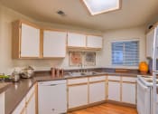 Thumbnail 17 of 29 - Kitchen With Refrigerator at Arterra, Albuquerque