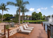 Thumbnail 20 of 39 - Sundeck with lounge chairs at Yacht Club, Bradenton, FL