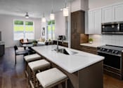 Thumbnail 39 of 56 - Modern Kitchen with cabinets at Aerie Blue Sage, Nebraska