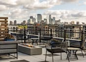 Thumbnail 17 of 40 - Patio with firepit at Revel, Minneapolis
