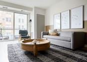 Thumbnail 38 of 40 - Furnished Living room with couch at Revel, Minneapolis, Minnesota