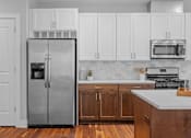 Thumbnail 1 of 31 - Kitchen with cabinets at Boutique 28, Minneapolis, MN