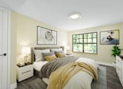 Thumbnail 1 of 14 - A bedroom with a bed, nightstands, and a window.