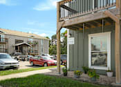 Thumbnail 5 of 16 - A small green building with a white window and a sign that says "OFFICE" on it.