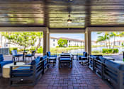 Thumbnail 11 of 24 - Patio with chairs at Portofino Cove, Fort Myers, 33916