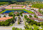 Thumbnail 1 of 31 - Large building complex view at The Falls of Portofino , Naples, FL, 34119