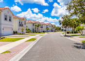 Thumbnail 3 of 31 - Street view at The Falls of Portofino , Naples, FL