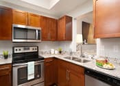 Thumbnail 9 of 14 - Fully Equipped Kitchen at Portofino Cove, Fort Myers, FL, 33916