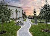 Thumbnail 4 of 19 - BBQ Area walk trail  at The Grove at Portofino Vineyards, Florida, 33967
