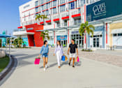 Thumbnail 16 of 27 - People Walking On A Street at Icon One, Florida, 32114
