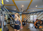 Thumbnail 6 of 24 - Woman working out at Portofino Cove, Fort Myers