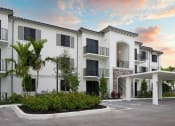 Thumbnail 1 of 29 - a rendering of the exterior of a building at sunset at Portofino Vineyards, Fort Myers, FL 33967