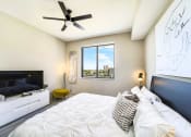 Thumbnail 20 of 23 - Bedroom With Ceiling Fan at Quantum Apartments, Florida, 33304