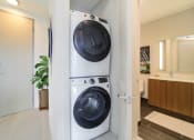 Thumbnail 18 of 23 - Stacked Washer/Dryer at Quantum Apartments, Fort Lauderdale, 33304
