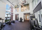 Thumbnail 8 of 23 - Quantum Apts gym with ample cardio and weight training equipment