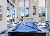 Thumbnail 6 of 23 - Interior of Quantum Clubhouse with billards table in the foreground.