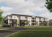 Thumbnail 4 of 20 - A modern apartment building with a car parked in front.