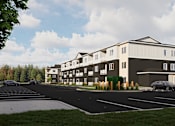 Thumbnail 5 of 20 - A large building with a parking lot in front of it.