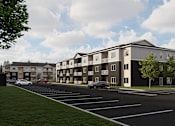 Thumbnail 3 of 20 - A modern apartment complex with a parking lot in front.
