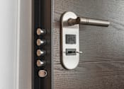 Thumbnail 11 of 12 - a close up of a door handle with a key in it